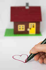 Image showing Hand write painting heart and house on background.