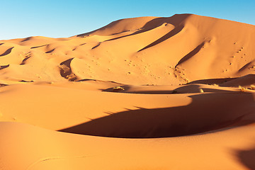 Image showing Sand dunes and blue sky