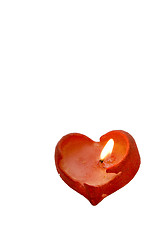 Image showing Burning heart shaped candle 