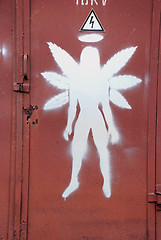 Image showing Six-winged graffiti figure 