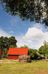 Image showing Red building in village 