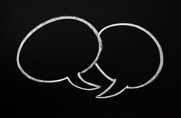 Image showing Two speech bubbles on a blackboard