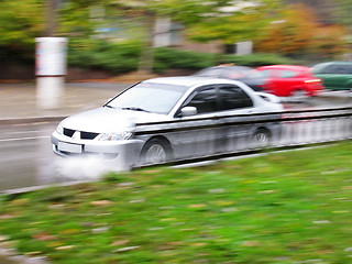 Image showing car on a wet road 