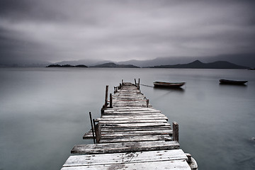 Image showing pier and boat, low saturation