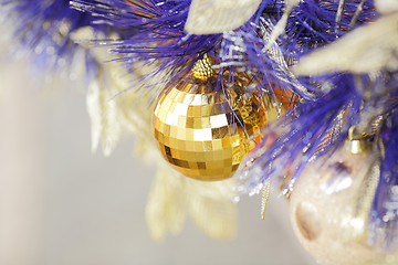 Image showing christmas ball on blue color christmas tree