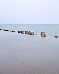 Image showing broken stone bridge on sea