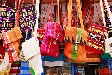 Image showing Colorful bags in a market in the street