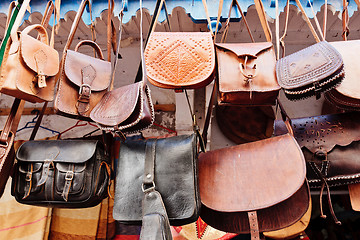 Image showing Leather bags in a market in the street
