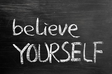 Image showing Believe yourself text written on blackboard