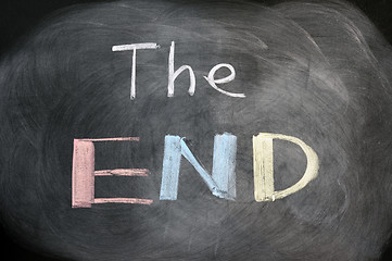 Image showing The end - handwritten with chalk on a blackboard with eraser smudges 