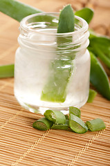 Image showing aloe vera juice with fresh leaves