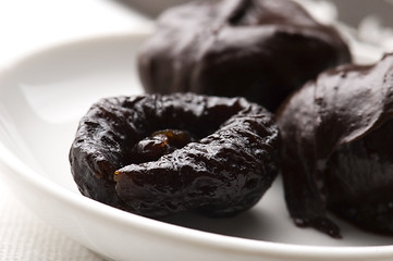 Image showing Dried plums in chocolate 