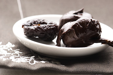 Image showing Dried plums in chocolate 
