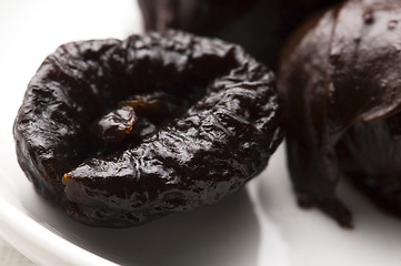 Image showing Dried plums in chocolate 