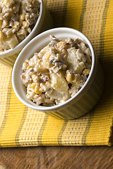 Image showing Salad with corn, ananas, nuts and rice