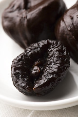 Image showing Dried plums in chocolate 