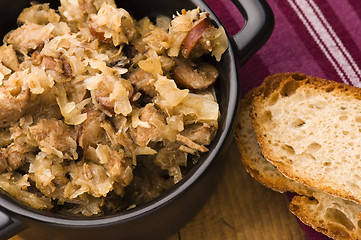 Image showing traditional polish sauerkraut (bigos) with mushrooms and plums f