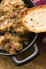 Image showing traditional polish sauerkraut (bigos) with mushrooms and plums f