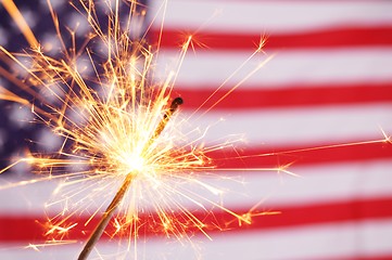 Image showing sparkler and usa flag