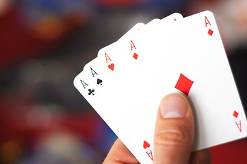 Image showing hand holding four aces