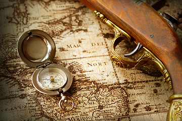 Image showing 	old compass on vintage map