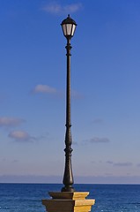 Image showing street lamp, sea and sky