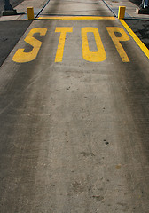 Image showing Yellow stop sign