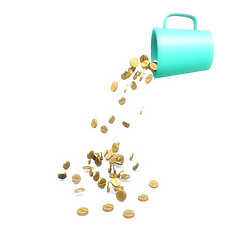 Image showing Gold tablets fall from a green mug