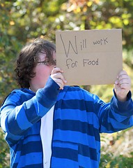 Image showing Young man will work for food