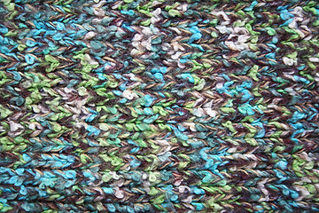 Image showing Knitted wool colorful fabric can use as background