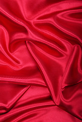 Image showing Smooth elegant red silk as background 