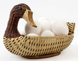 Image showing Duck basket with eggs