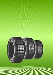 Image showing Brand new tires on a green background