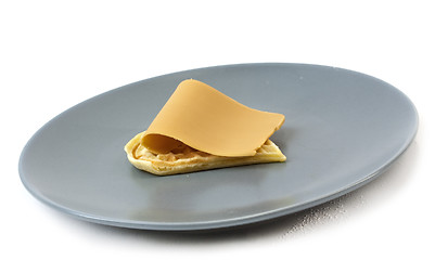 Image showing Single waffle with brown cheese