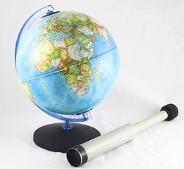 Image showing globe and a spyglass