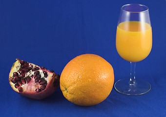 Image showing Pomegranate, orange and juice