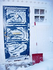 Image showing Blue door with snow
