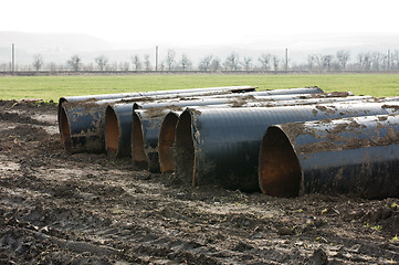 Image showing Old metal pipes dismantled for scrap 