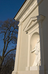 Image showing Holy statue holding sword in hand in cathedral arch.