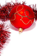 Image showing Isolated red christmas toy with glossy ornaments.