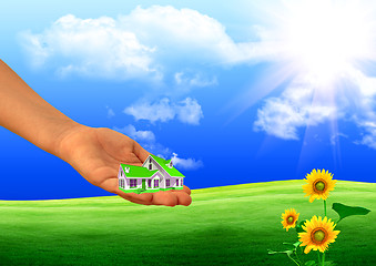 Image showing small house on a hand