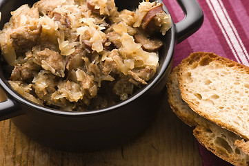 Image showing traditional polish sauerkraut (bigos) with mushrooms and plums f