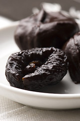 Image showing Dried plums in chocolate 