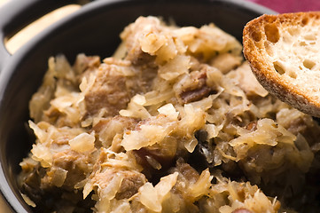 Image showing traditional polish sauerkraut (bigos) with mushrooms and plums f