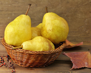 Image showing Yellow Pears In A Basket