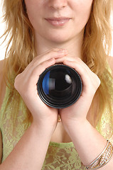 Image showing Girl holding a photo lense.