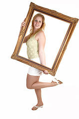 Image showing Girl with picture frame.   