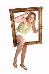 Image showing Girl going trough frame.