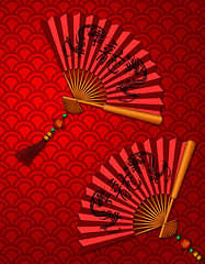 Image showing Chinese New Year Dragon Fans on Scales Pattern Background