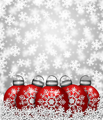 Image showing Red Snowflake Ornaments on Snow